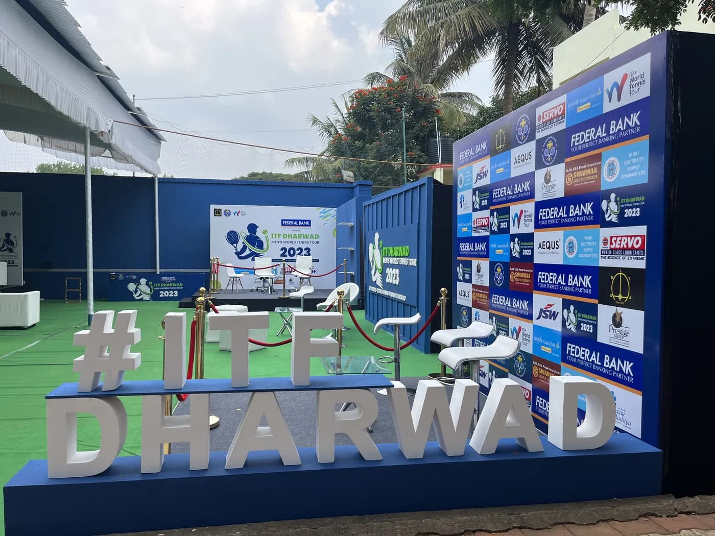 Sculpted #ITF Dharwad lettering beside the sponsor wall