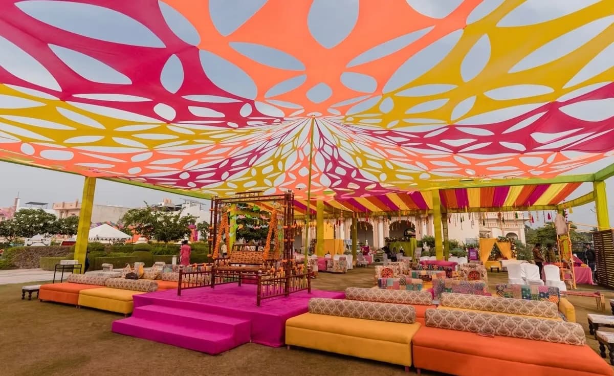 Colourful printed canopy over a mehendi lawn